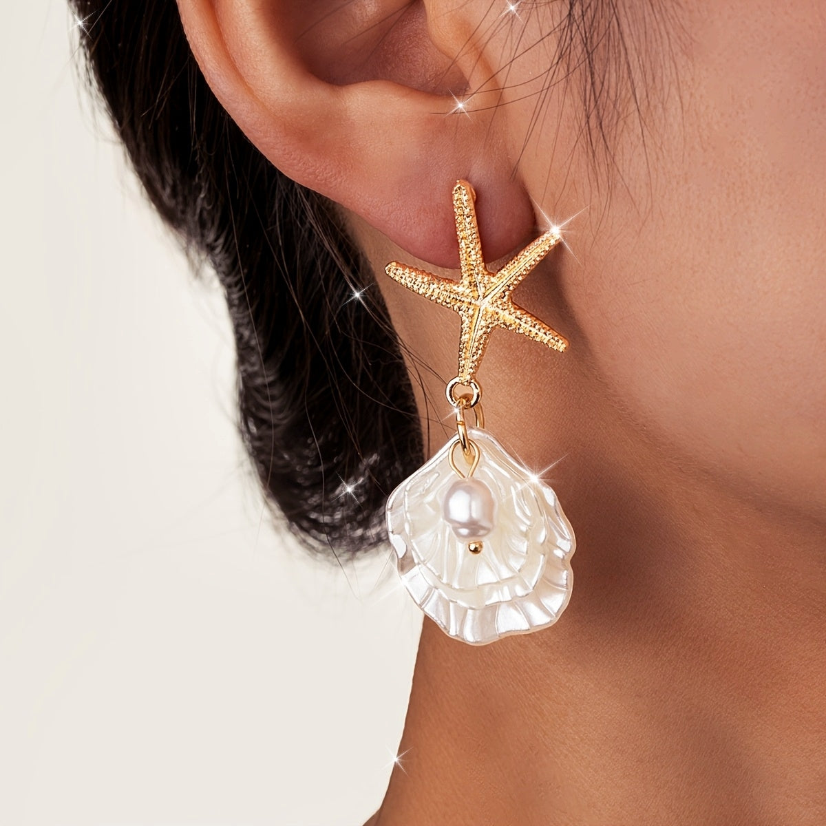 Gold Starfish Drop Earrings with Iridescent Seashell
