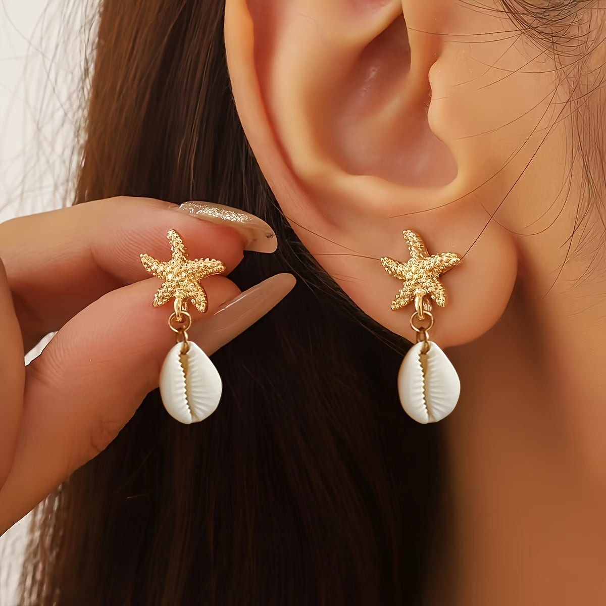 Gold Starfish and Cowrie Shell Dangle Earrings
