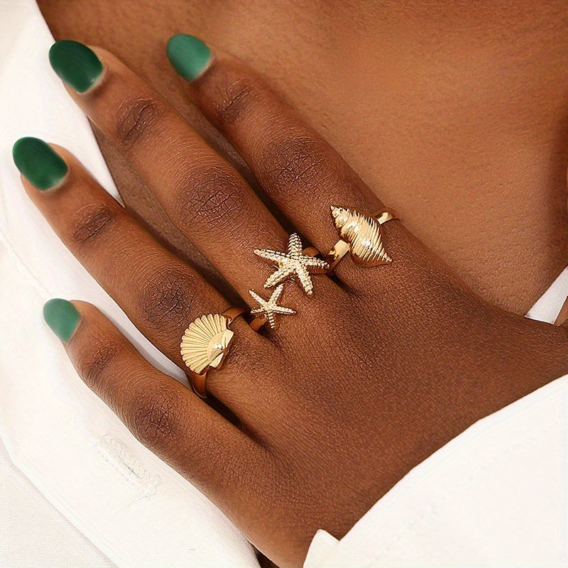 Gold Tone Ocean Shell and Starfish Rings