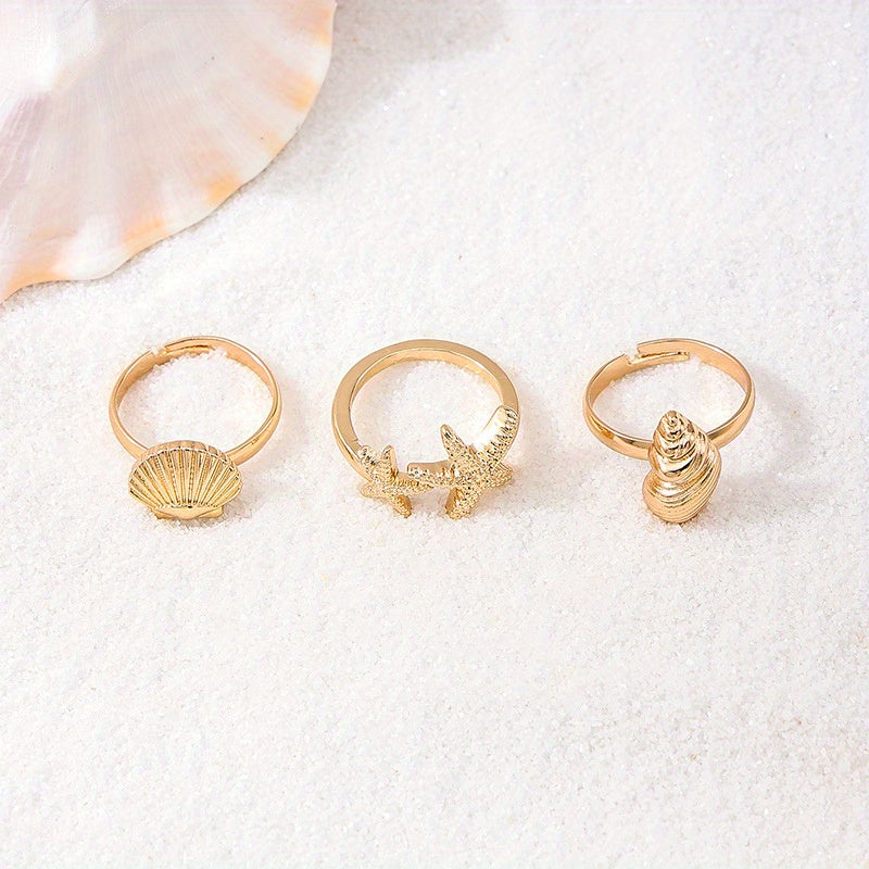Gold Tone Ocean Shell and Starfish Rings