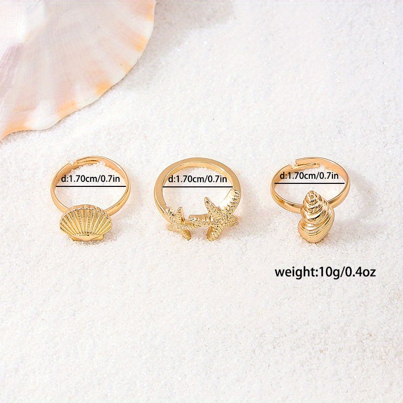 Gold Tone Ocean Shell and Starfish Rings