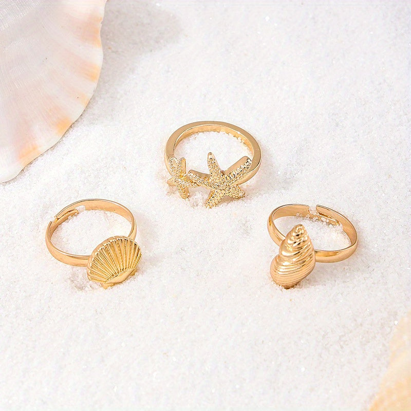 Gold Tone Ocean Shell and Starfish Rings