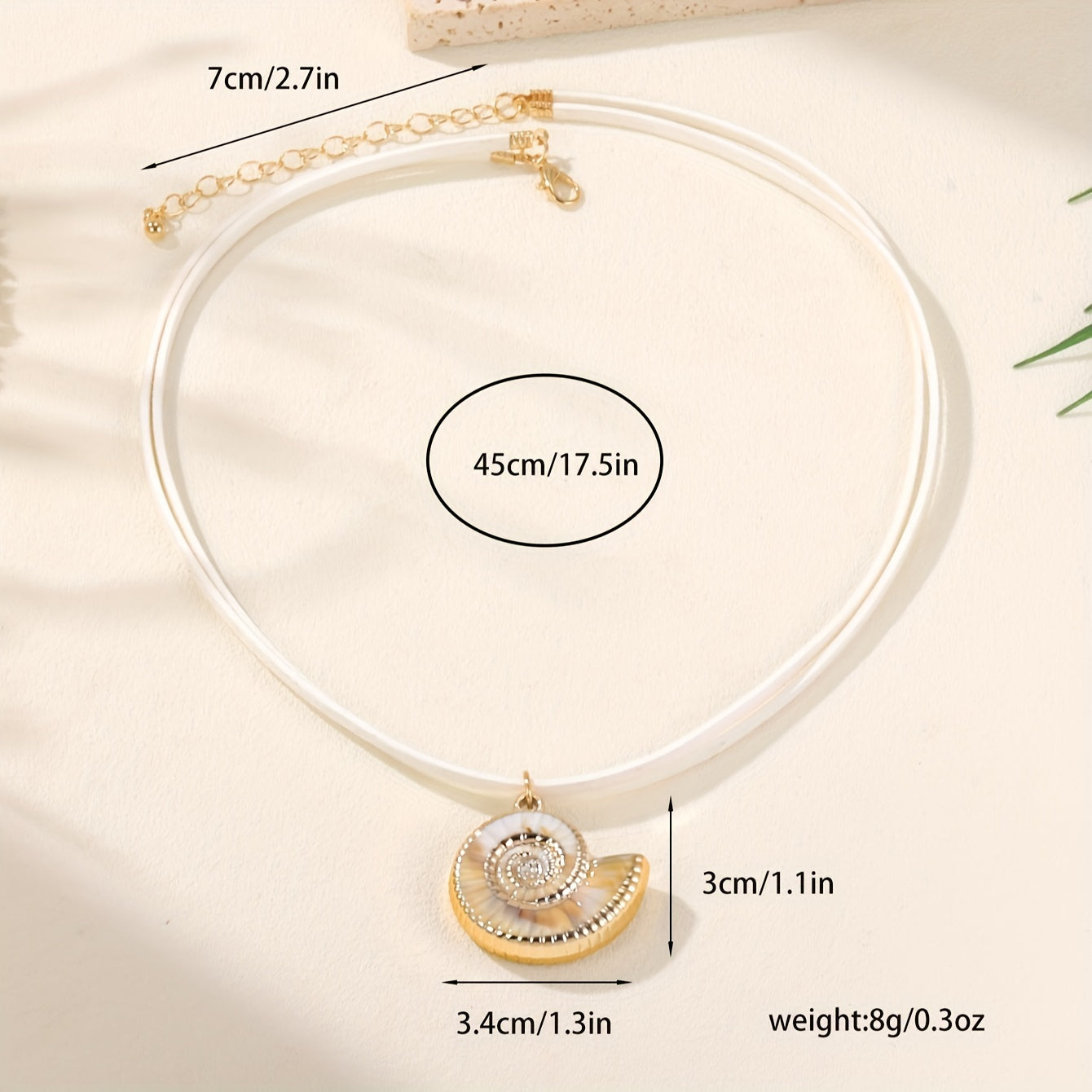 Gold Nautilus Shell Necklace on White Cord