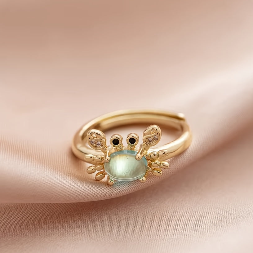 Adjustable Gold Crab Ring with Oval Blue Gem