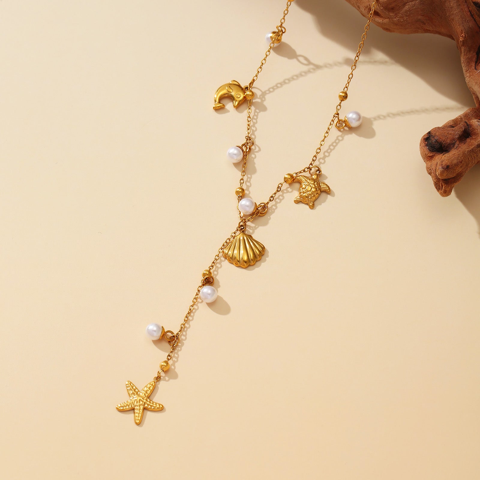 Gold-Tone Sea Charm Necklace with Pearl Drops