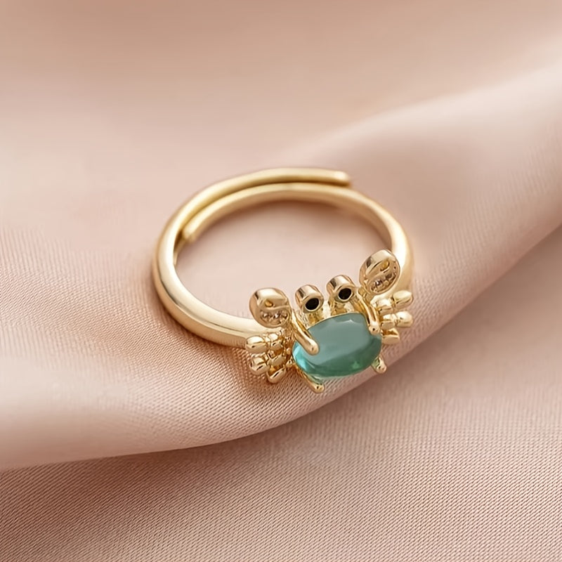 Adjustable Gold Crab Ring with Oval Blue Gem