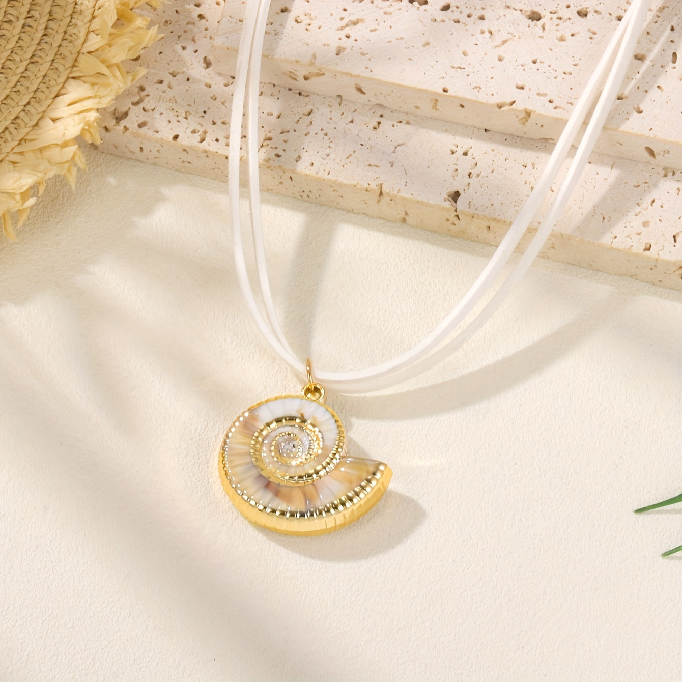 Gold Nautilus Shell Necklace on White Cord