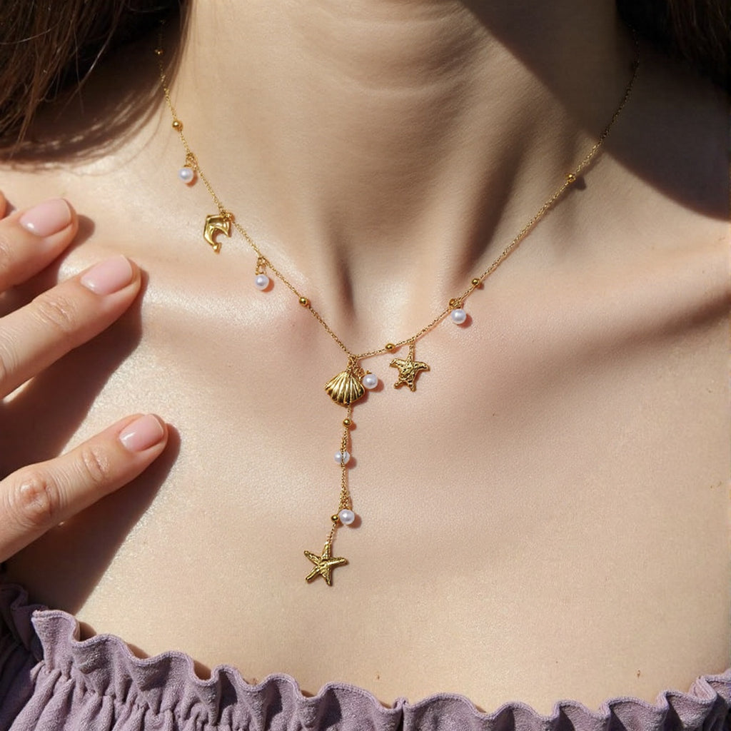 Gold-Tone Sea Charm Necklace with Pearl Drops