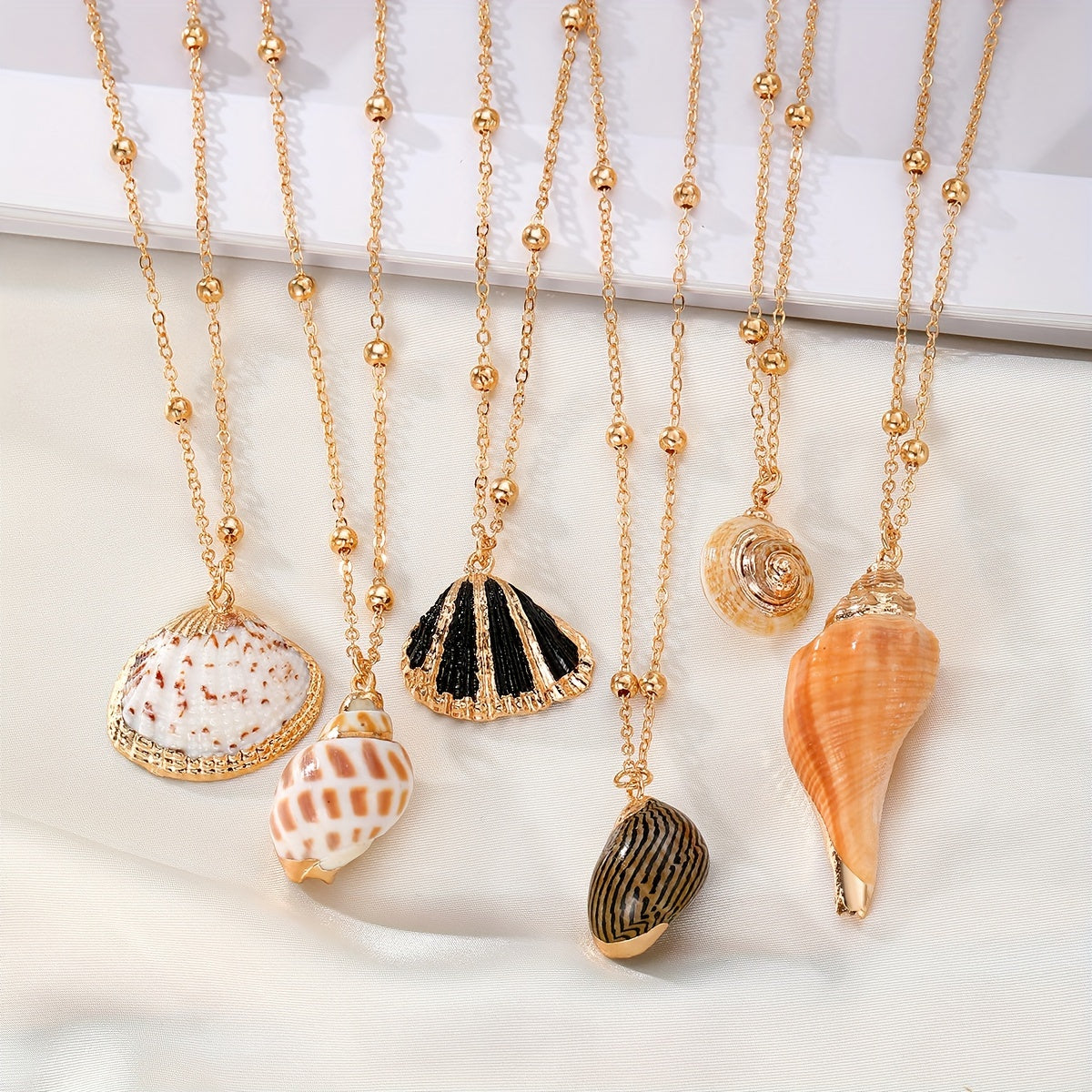Diverse Natural Shell Necklaces with Gold Chains