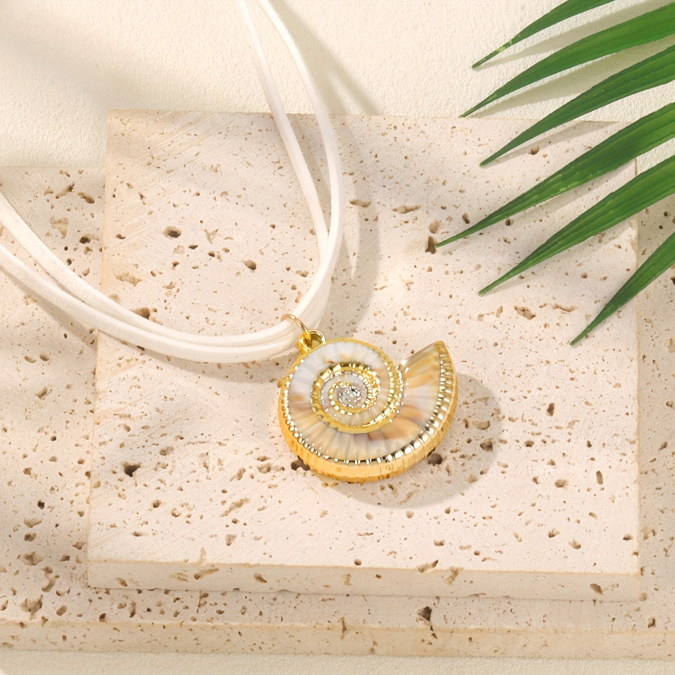 Gold Nautilus Shell Necklace on White Cord