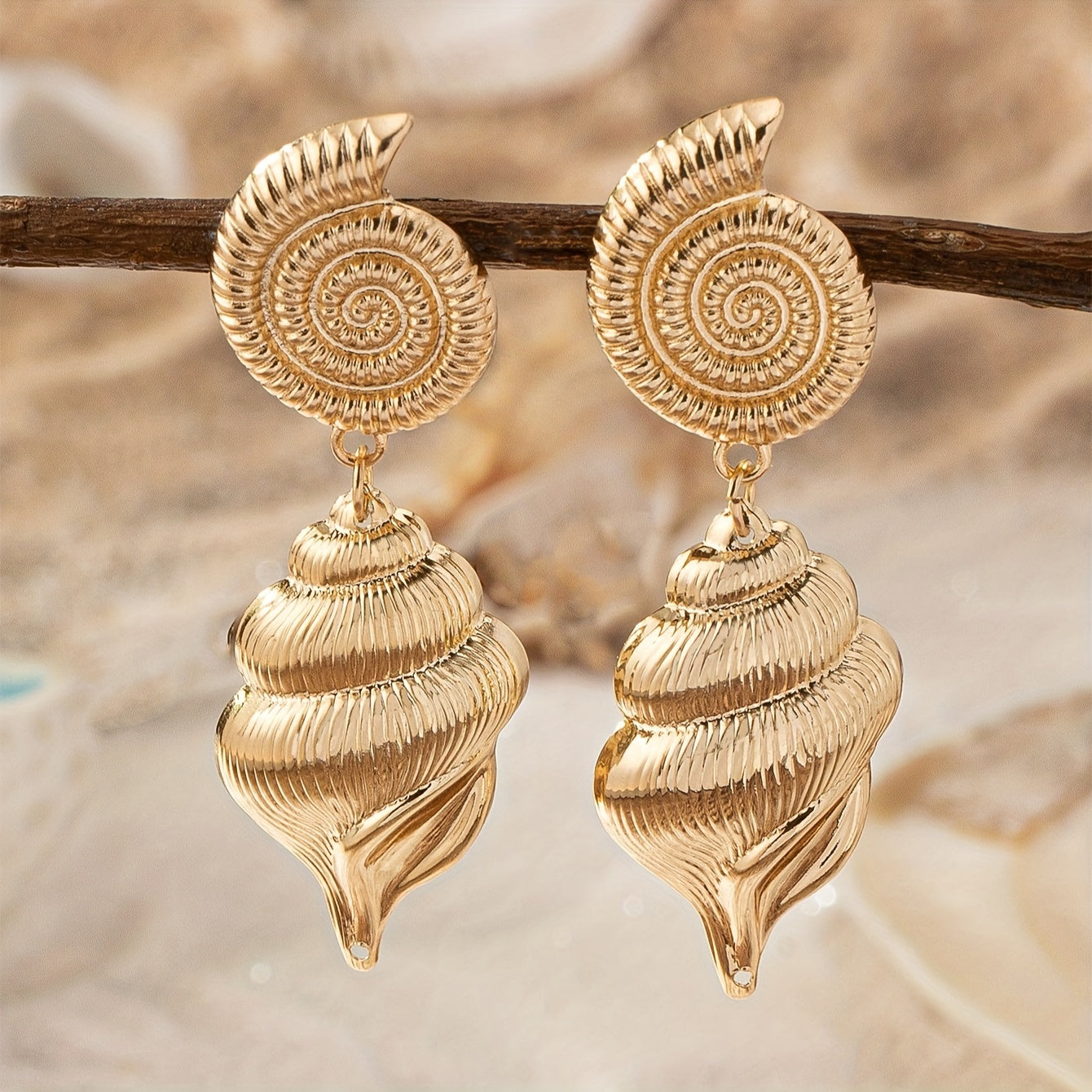Gold Tone Spiral Shell Drop Earrings