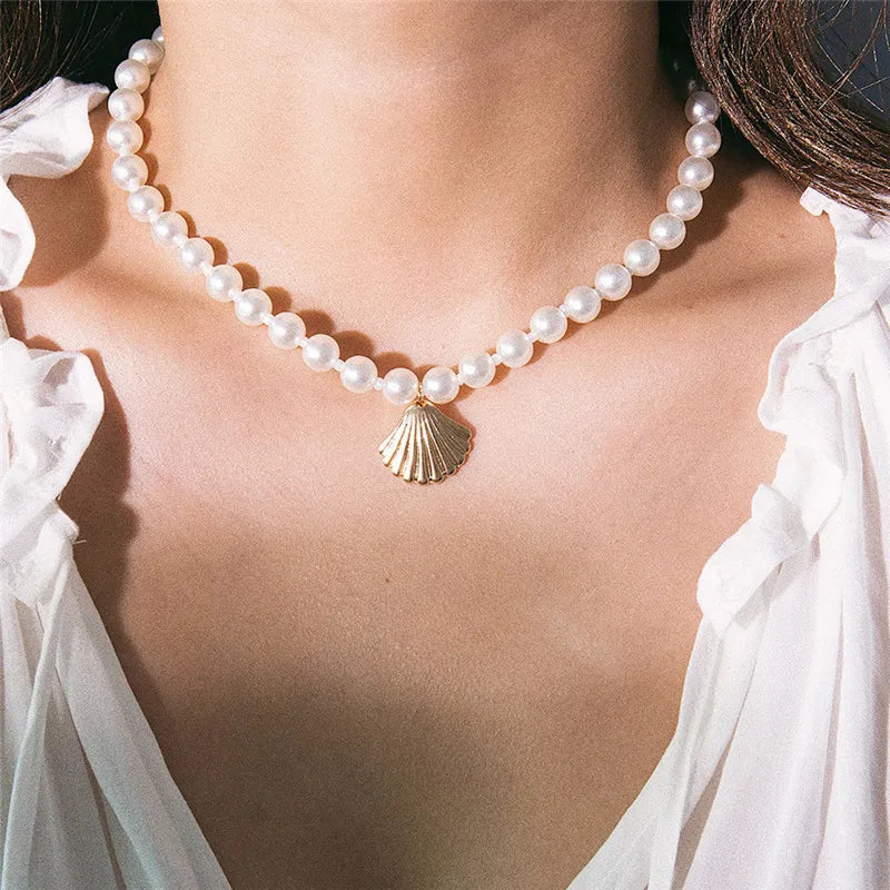 Pearl Necklace with Gold Shell Pendant