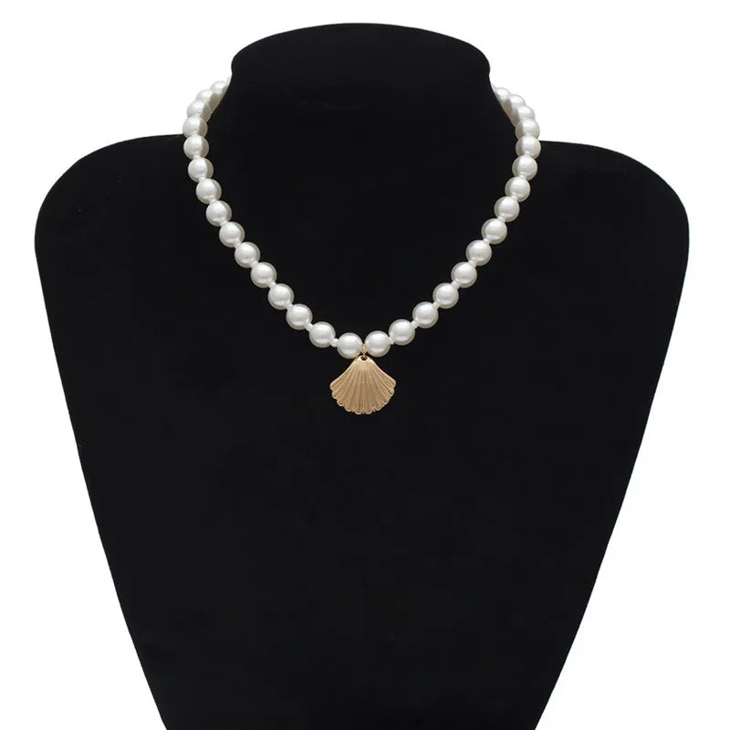 Pearl Necklace with Gold Shell Pendant