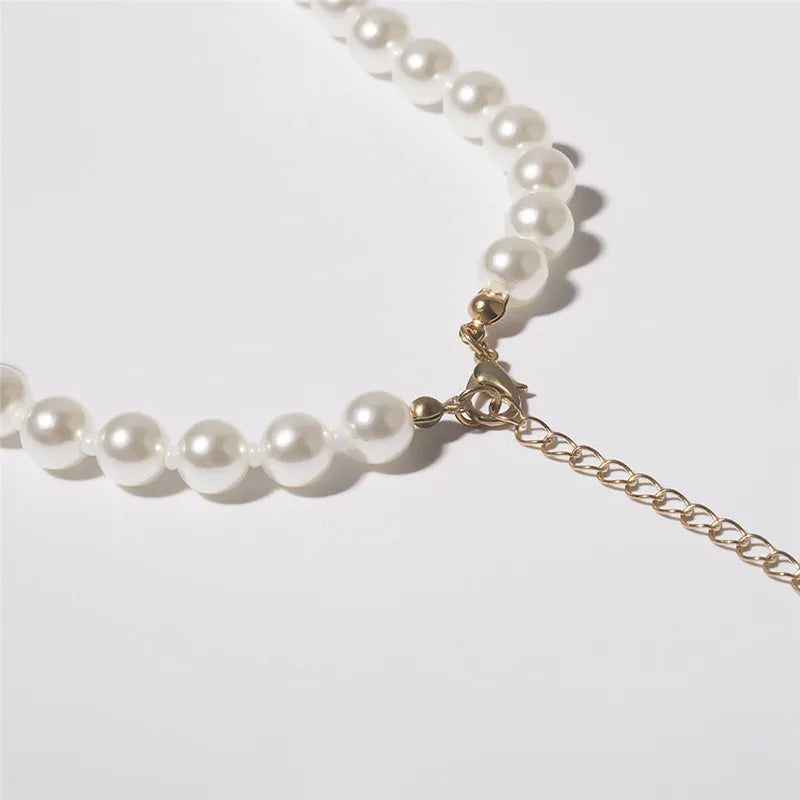 Pearl Necklace with Gold Shell Pendant