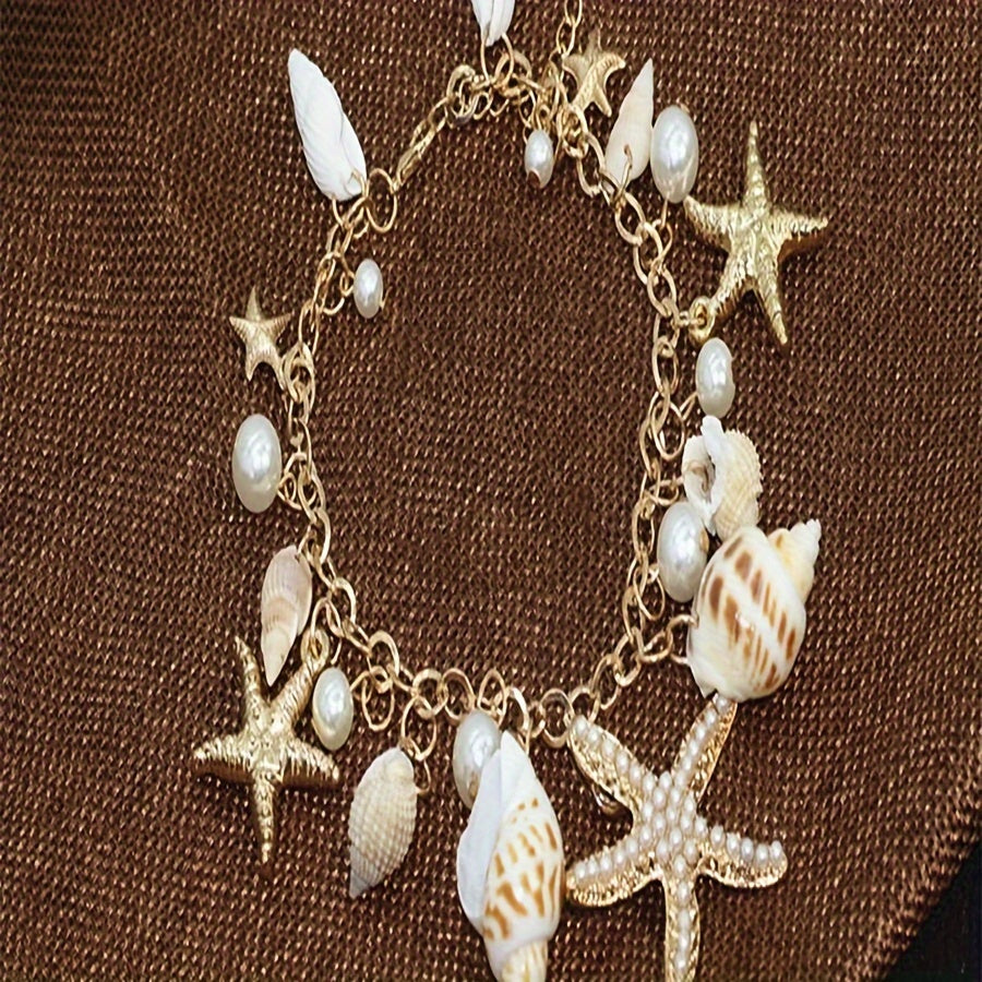 Gold Tone Seashell Starfish Pearl Charm Bracelet