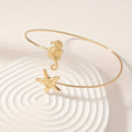 Bohemian Gold-Tone Arm Cuff with Seahorse Starfish