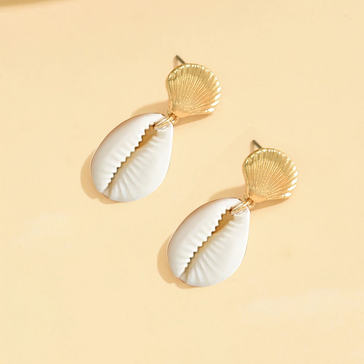 Gold Starfish and Cowrie Shell Dangle Earrings