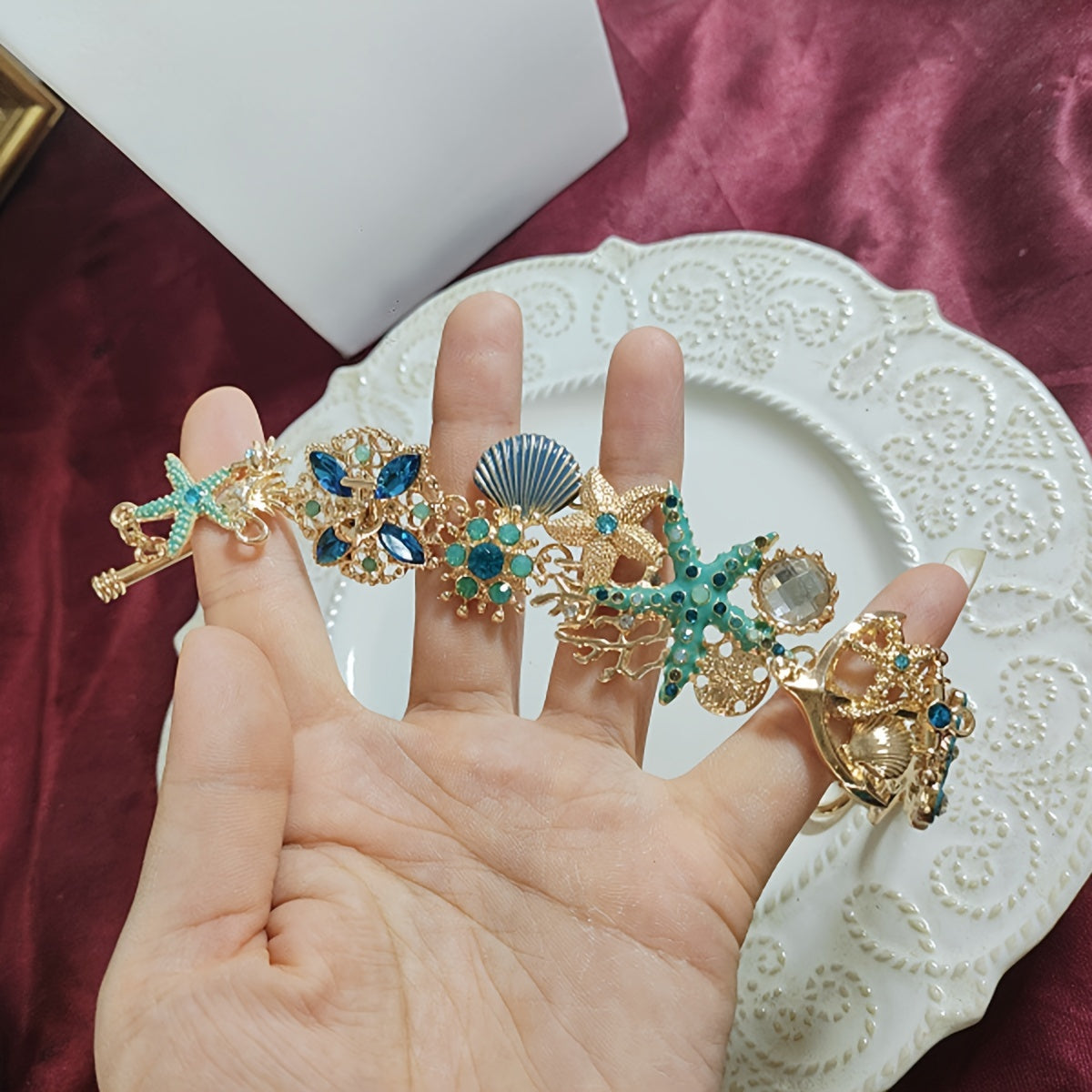 Gold Tone Sea Life Bracelet with Starfish & Blue Gems