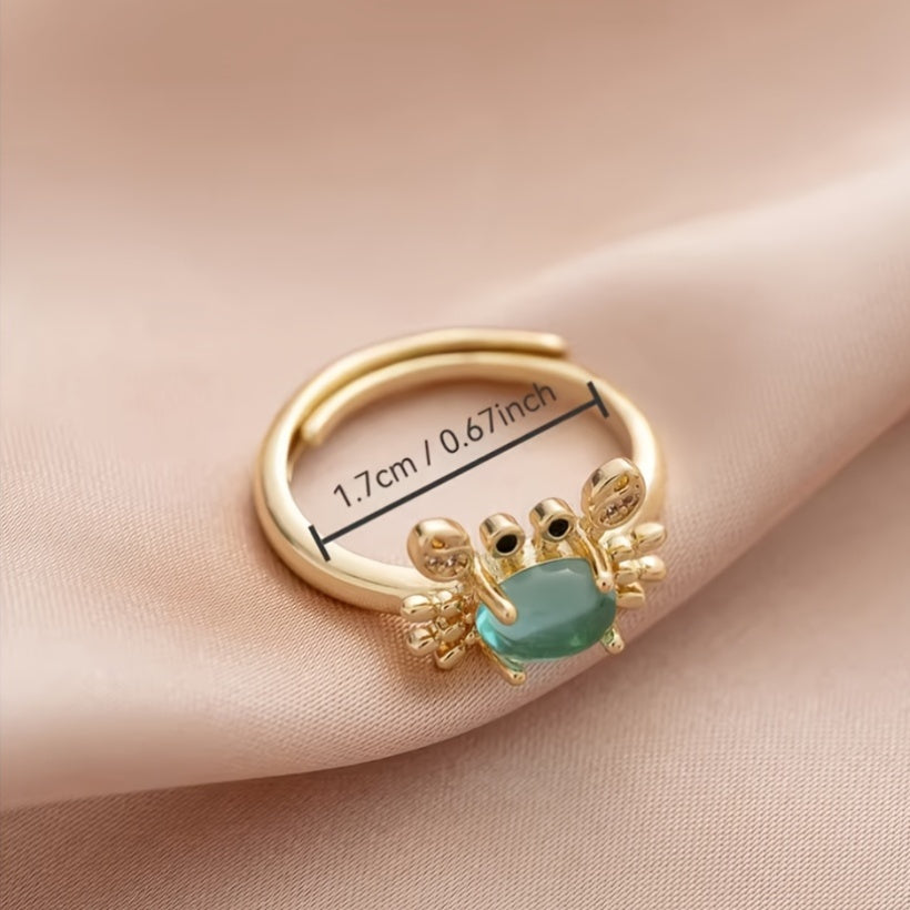 Adjustable Gold Crab Ring with Oval Blue Gem