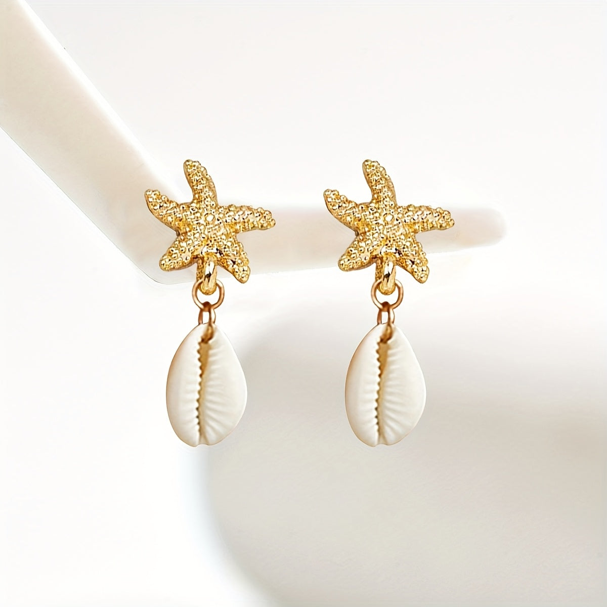 Gold Starfish and Cowrie Shell Dangle Earrings