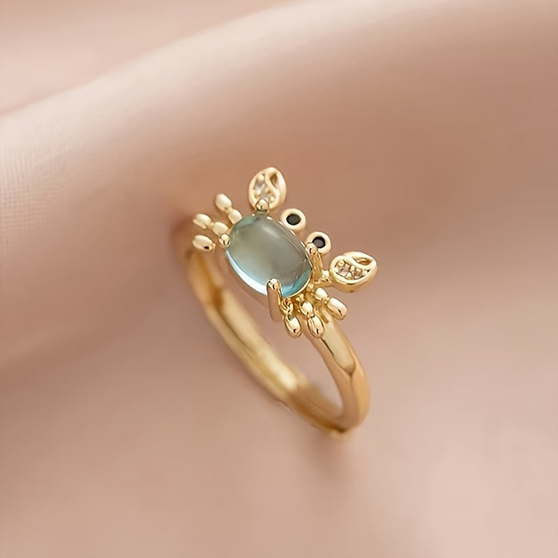 Adjustable Gold Crab Ring with Oval Blue Gem